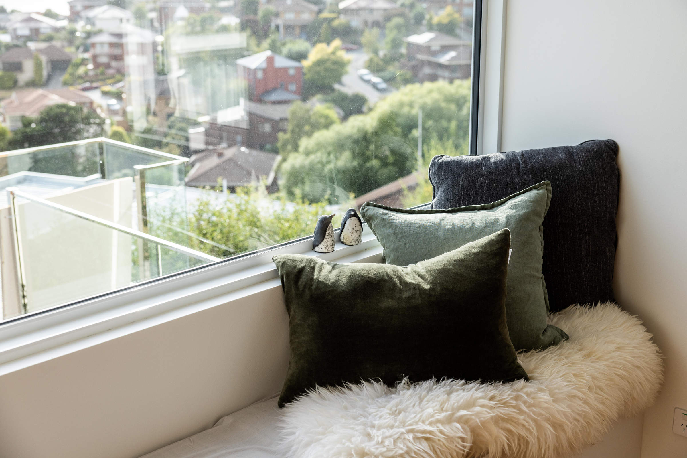 A lovely element of the lifestyle renovation of this 1970s house is the new window seat to take advantage of the water view and look out over the new deck extension. Credit: Jordan Davis.