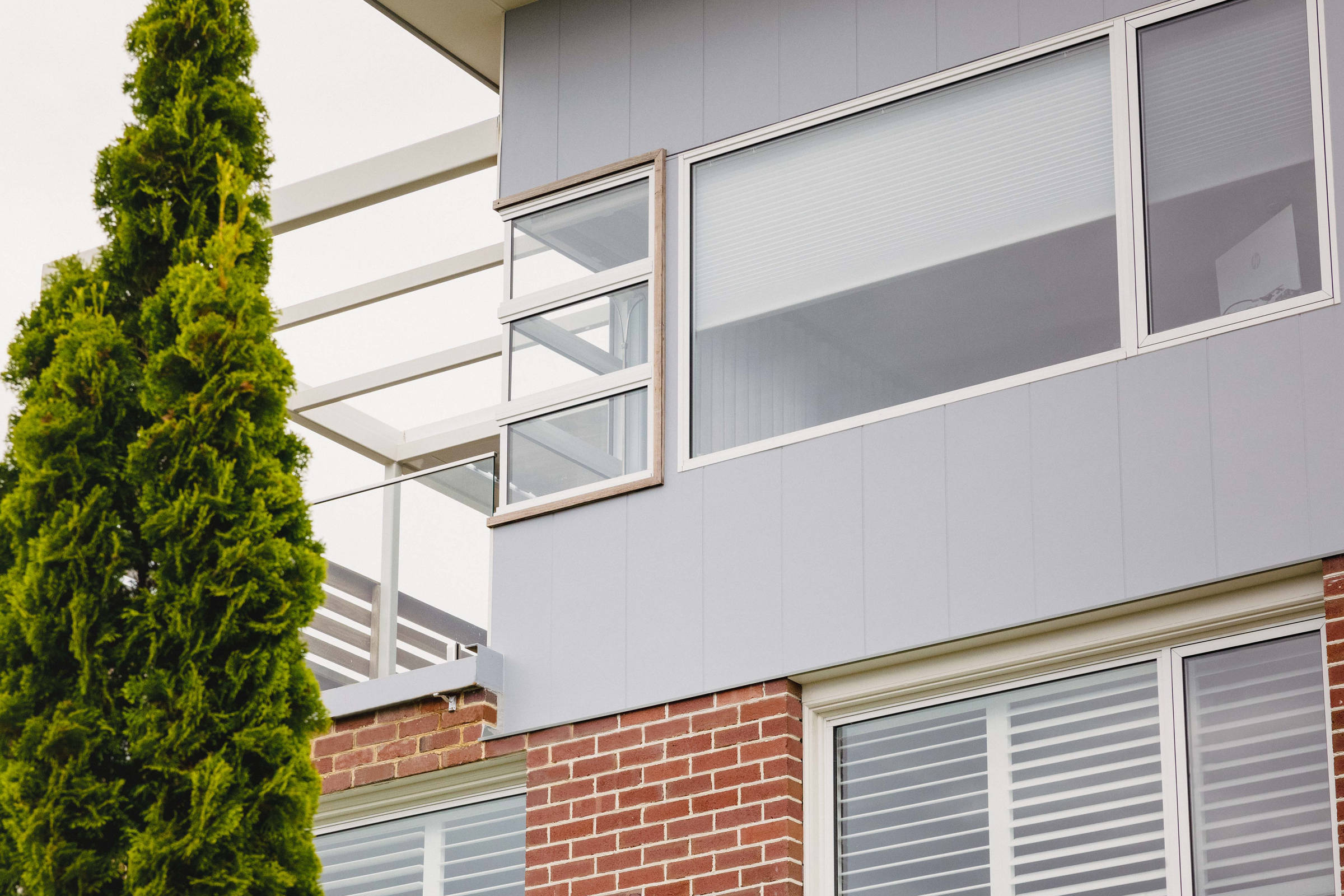 This Howrah home renovation added a second storey to a double brick 1960s house including external deck. Credit: Jordan Davis.